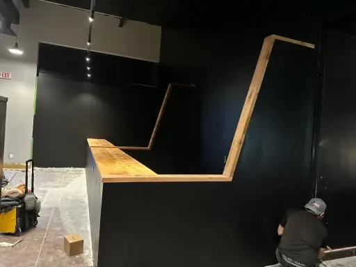 New bar framing and timber counter going in during a commercial fit out